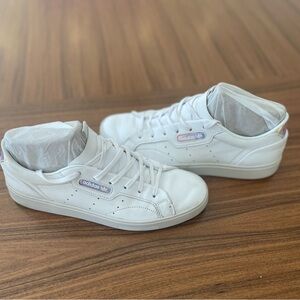 Woman’s Adidas tennis shoes 
**Woman’s size 9